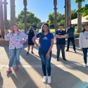 College Tour cast in front of palm trees on campus